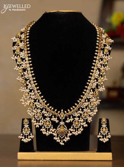 Antique guttapusalu haaram lakshmi design with kemp & cz stones and pearl hangings