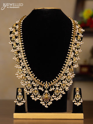 Antique guttapusalu haaram lakshmi design with kemp & cz stones and pearl hangings