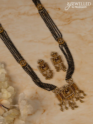 Mangalsutra long with ruby & kundan cz stones and golden beads hangings