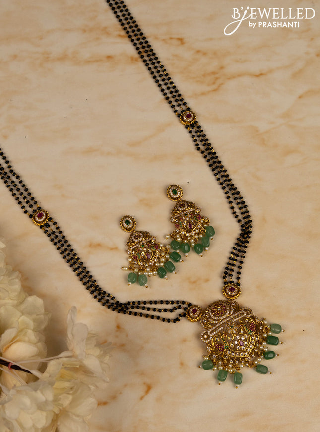 Mangalsutra with kemp and cz stones in pearl & mint green beads hangings
