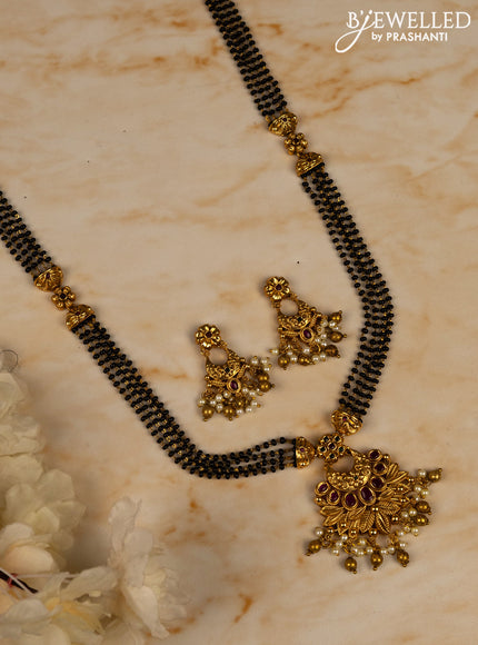 Mangalsutra long with kemp stones in pearl & golden beads hangings