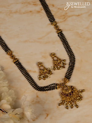 Mangalsutra long with kemp stones in pearl & golden beads hangings