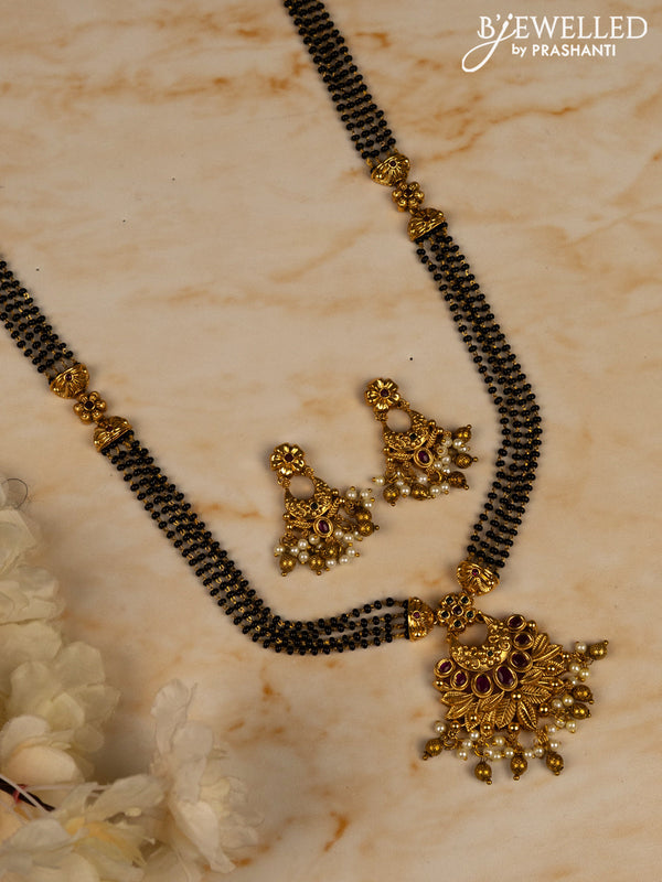 Mangalsutra long with kemp stones in pearl & golden beads hangings