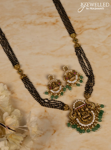Mangalsutra long lakshmi pendant with kemp & cz stones in pearl & mint green beads hangings
