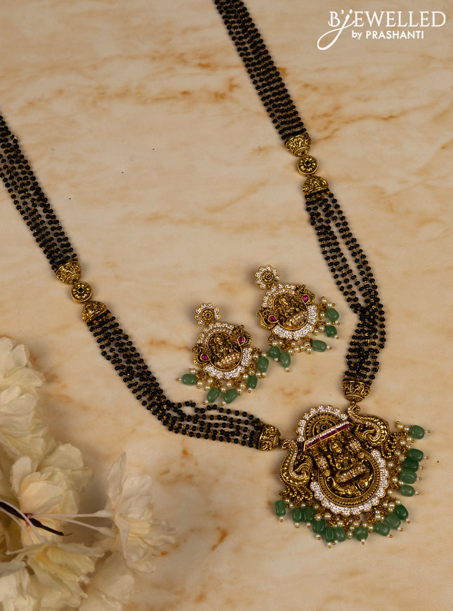 Mangalsutra long lakshmi pendant with kemp & cz stones in pearl & mint green beads hangings