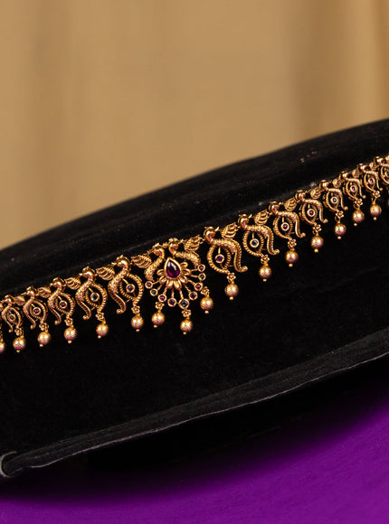 Antique hip chain peacock deisgn in multicolor kemp stones and golden ball hanging