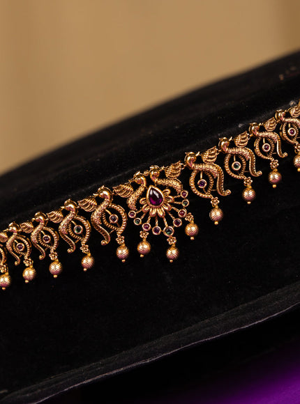 Antique hip chain peacock deisgn in multicolor kemp stones and golden ball hanging