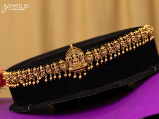 Antique hip chain lakshmi deisgn in red,white and cz stones and golden ball hanging
