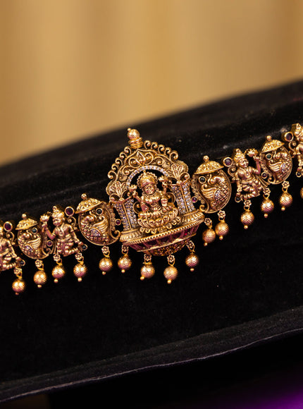 Antique hip chain lakshmi deisgn in red,white and cz stones and golden ball hanging