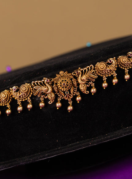 Antique hip chain peacock & floral deisgn in jadau kundan stones and golden ball hanging