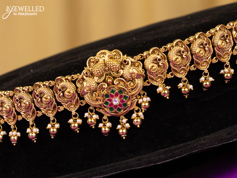 Antique hip chain peacock & floral deisgn in jadau kundan stones and golden ball hanging