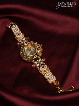 Antqiue watch with white dial in jadau stones and green beads