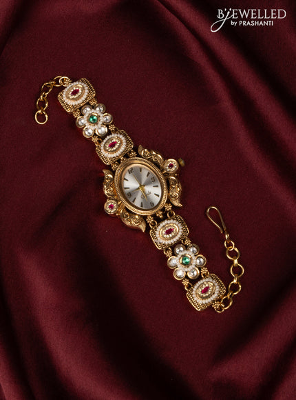 Antqiue watch with oval white dial in jadau stones and white beads
