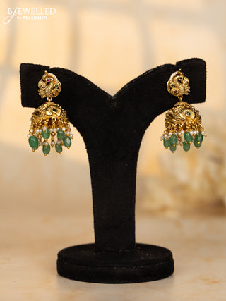 Antique jhumka peacock deisgn in red and green kemp stones and green beads hanging