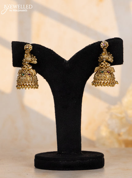 Antique jhumka double peacock design with pink and green stone & golden ball hanging