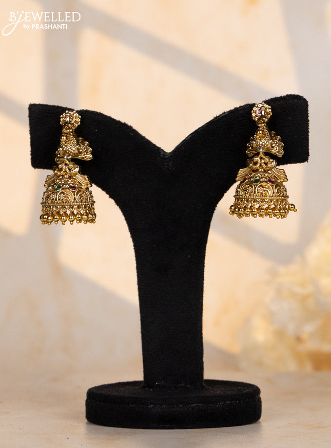 Antique jhumka double peacock design with pink and green stone & golden ball hanging
