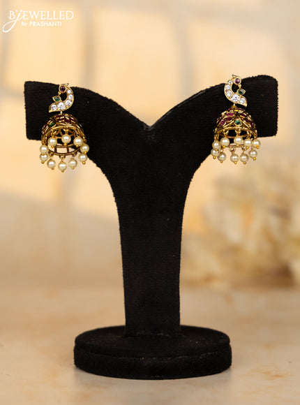 Antique medium size jhumka with peacock design in multicolor kemp and pearl hanging