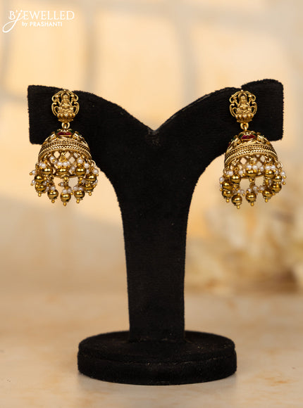 Antique jhumka lakshmi deisgn in jadau stones and pearl golden ball hangings