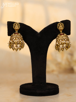 Antique jhumka lakshmi deisgn in jadau stones and pearl golden ball hangings