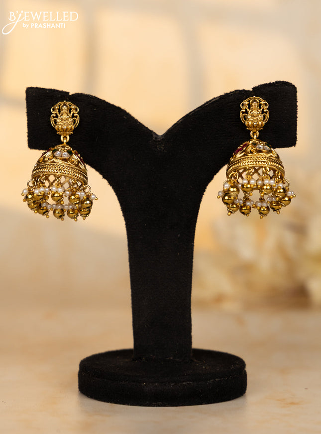 Antique jhumka lakshmi deisgn in jadau kundan stones and pearl golden ball hangings