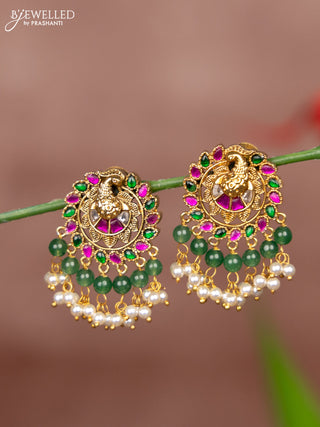 Antique earring peacock deisgn in jadau kundan stones and pearl hanging