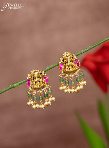 Antique earring lakshmi deisgn in jadau stones and pearl hanging