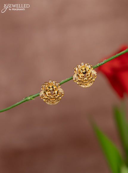 Antique earring with god face in white stones