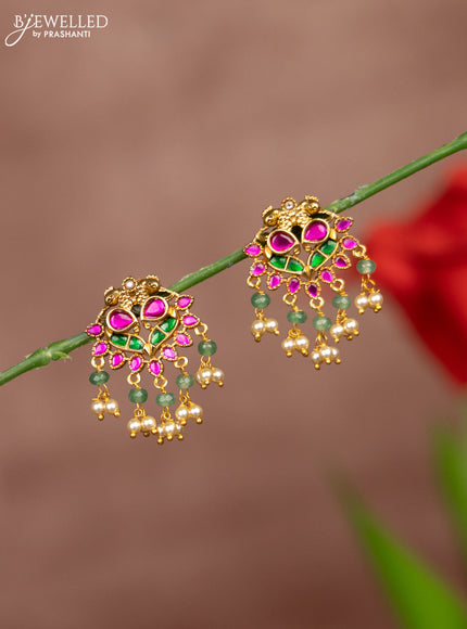 Antique earring double peacock deisgn in jadau stones and pearl hangings