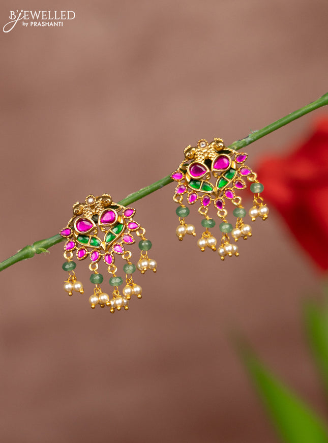 Antique earring double peacock deisgn in jadau stones and pearl hangings