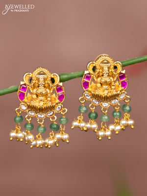 Antique earring lakshmi deisgn in jadau stones in gold finish with pearl hangings