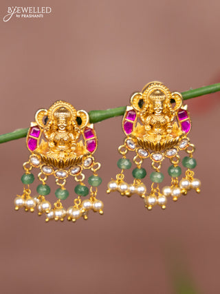 Antique earring lakshmi deisgn in jadau stones in gold finish with pearl hangings