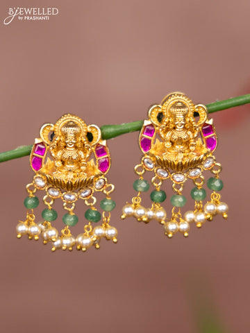 Antique earring lakshmi deisgn in jadau stones in gold finish with pearl hangings