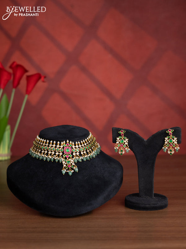 Antique choker with kemp jadau kundan stones in mint green beads hangings
