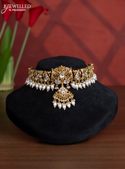 Antique choker peacock design with kundan and cz stones in pearl hangings