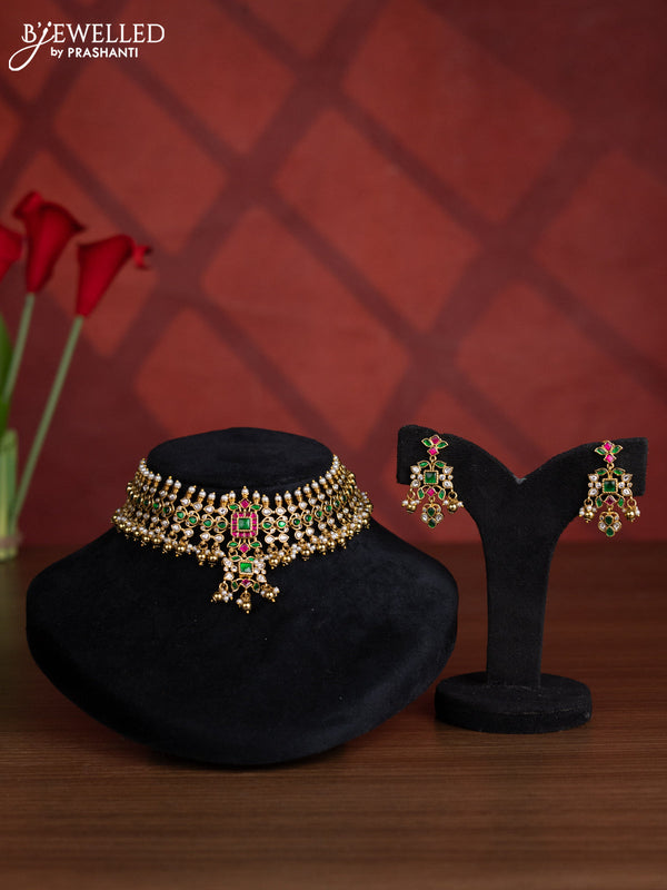 Antique choker with kemp jadau kundan stones in golden beads hangings