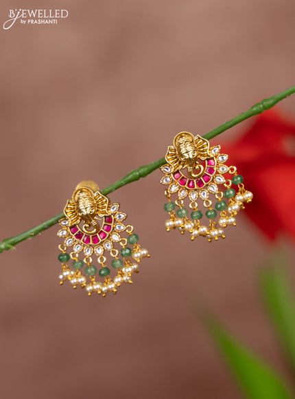 Antique earring ganesh face with jadau kundan stones and pearl hanging