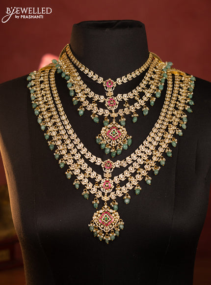 Antique combo set triple layer with kemp jadau and kundan cz stones in pearl & mint green beads hangings