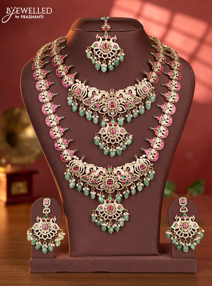Antique combo set peacock design with kemp jadau and cz stones in pearl & mint green beads hangings