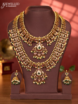 Antique combo set floral design with kemp & cz stones and pearl & green beads hangings
