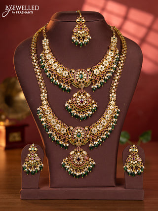 Antique combo set floral design with kemp & cz stones and pearl & green beads hangings