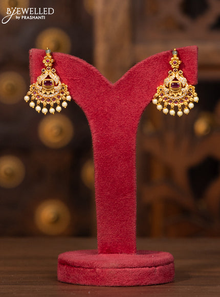 Antique necklace with pink kemp and cz stones in pearl hangings