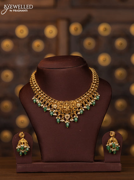 Antique necklace lakshmi design with pink kemp and cz stones in mint green beads hangings