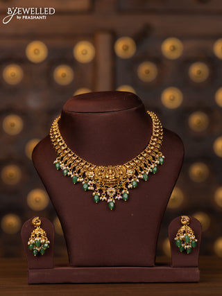 Antique necklace lakshmi design with pink kemp and cz stones in mint green beads hangings
