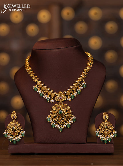 Antique necklace peacock design with kemp and cz stones in pearl & mint green beads hangings