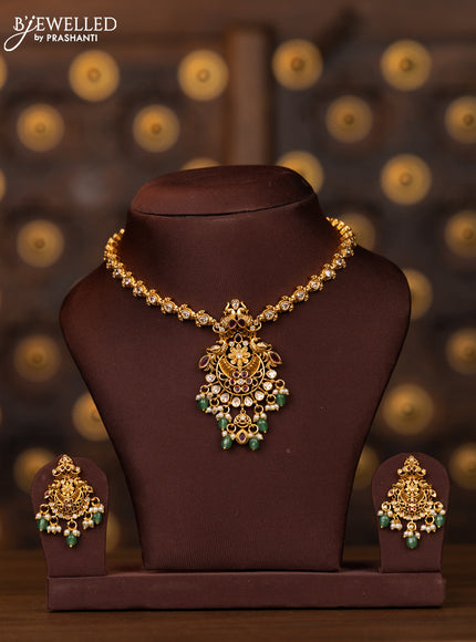 Antique necklace with pink kemp and kundan stones in mint green beads hangings