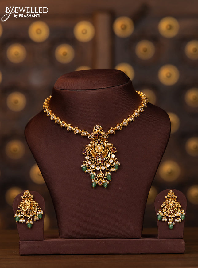 Antique necklace with pink kemp and kundan stones in mint green beads hangings