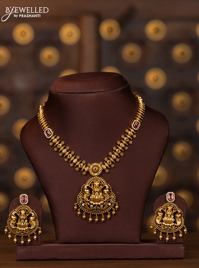Antique necklace lakshmi design with kemp and cz stones and golden beads hangings