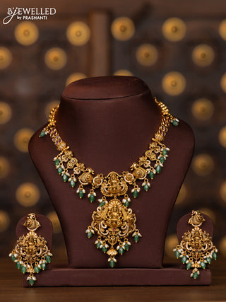Antique necklace lakshmi design with pink kemp and cz stones in pearl & mint green beads hangings