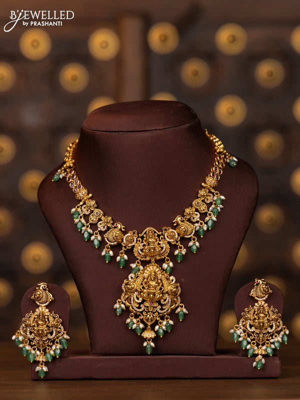 Antique necklace lakshmi design with pink kemp and cz stones in pearl & mint green beads hangings