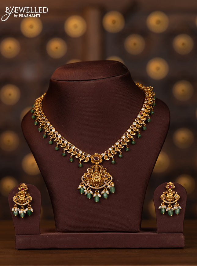 Antique necklace lakshmi design with pink kemp and cz stones in mint green beads hangings